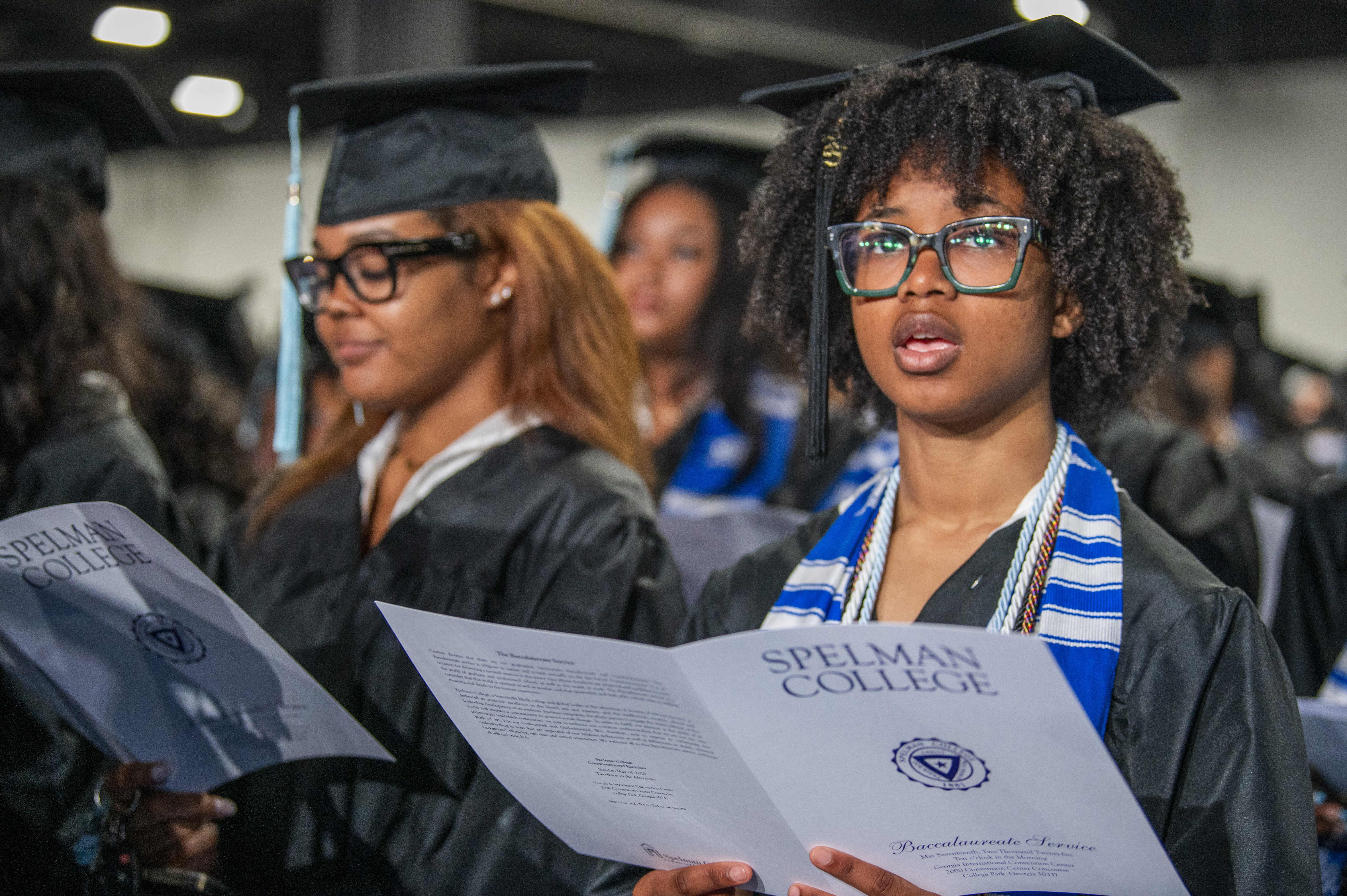 Student holding Commencement program