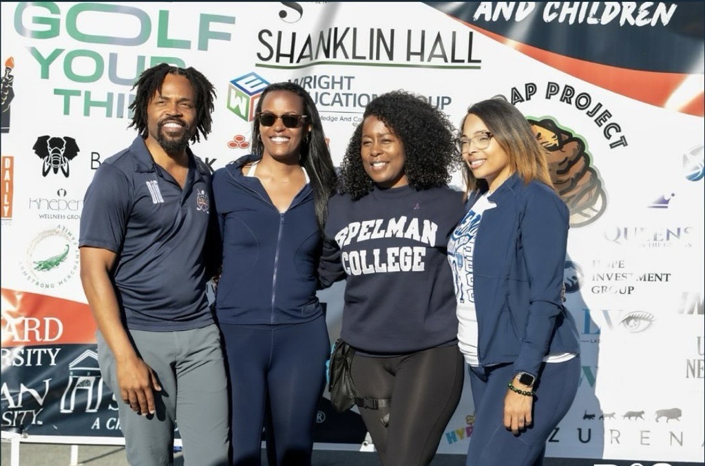 Group shot of Title IX Office at golf tournament